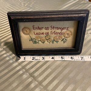 Enter As Strangers Leave as Friends Framed saying